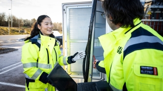 Two ABB E-mobility technicians performing on-site service