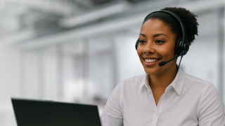 ABB E-mobility employee working in a customer service call center