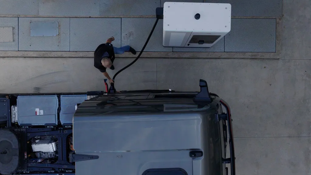 MAN e-truck is charging at the ABB E-mobility MCS1200.