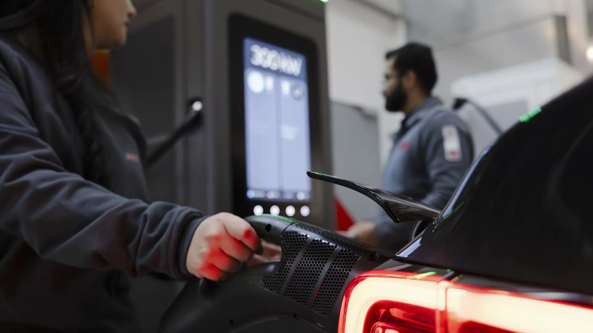 ABB E-mobility engineers performing a test on the A300 charger