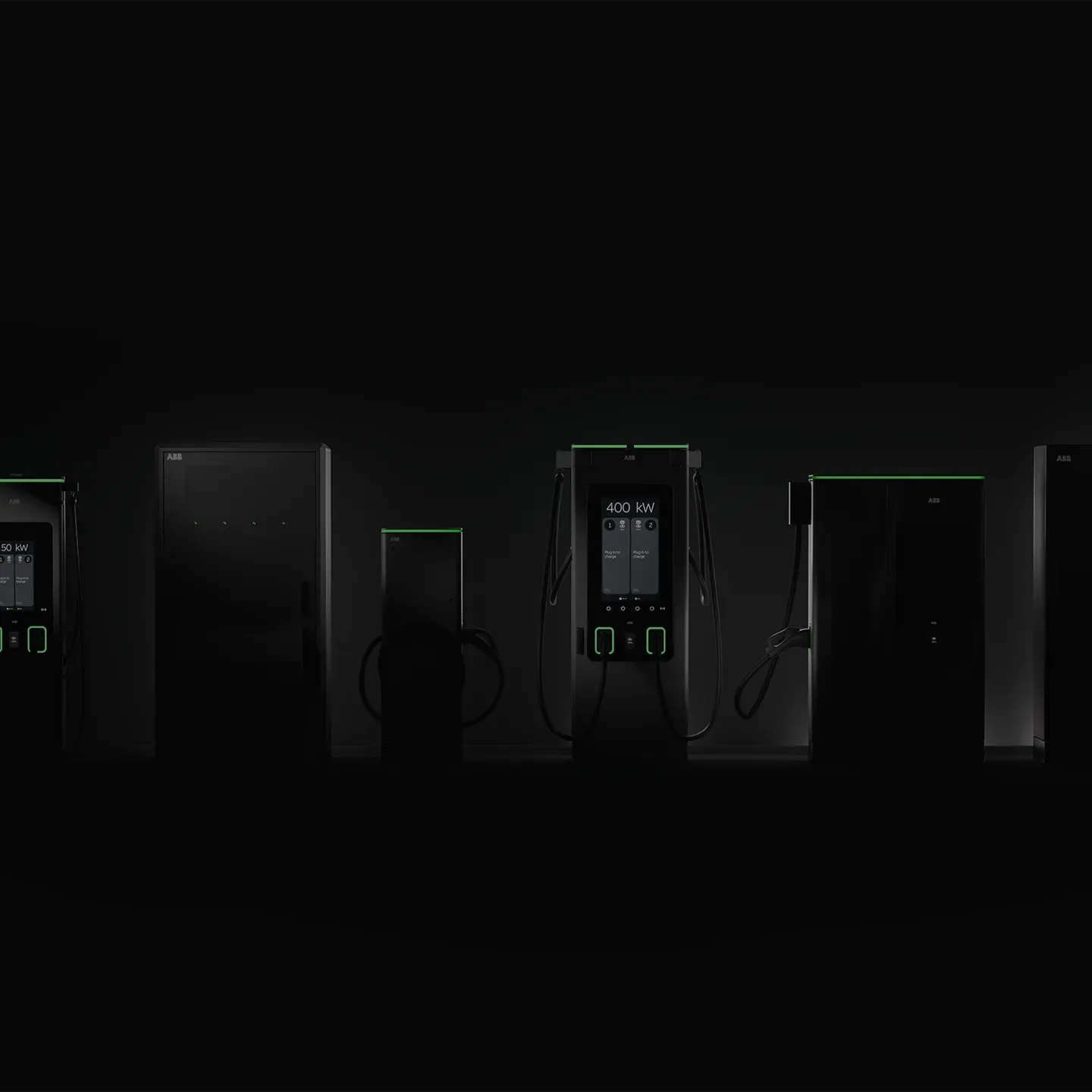 ABB E-mobility next-generation chargers in a line with dark, mysterious lighting