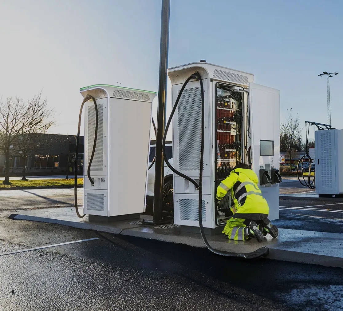 ABB E-mobility contractor servicing a customer's EV charger on site