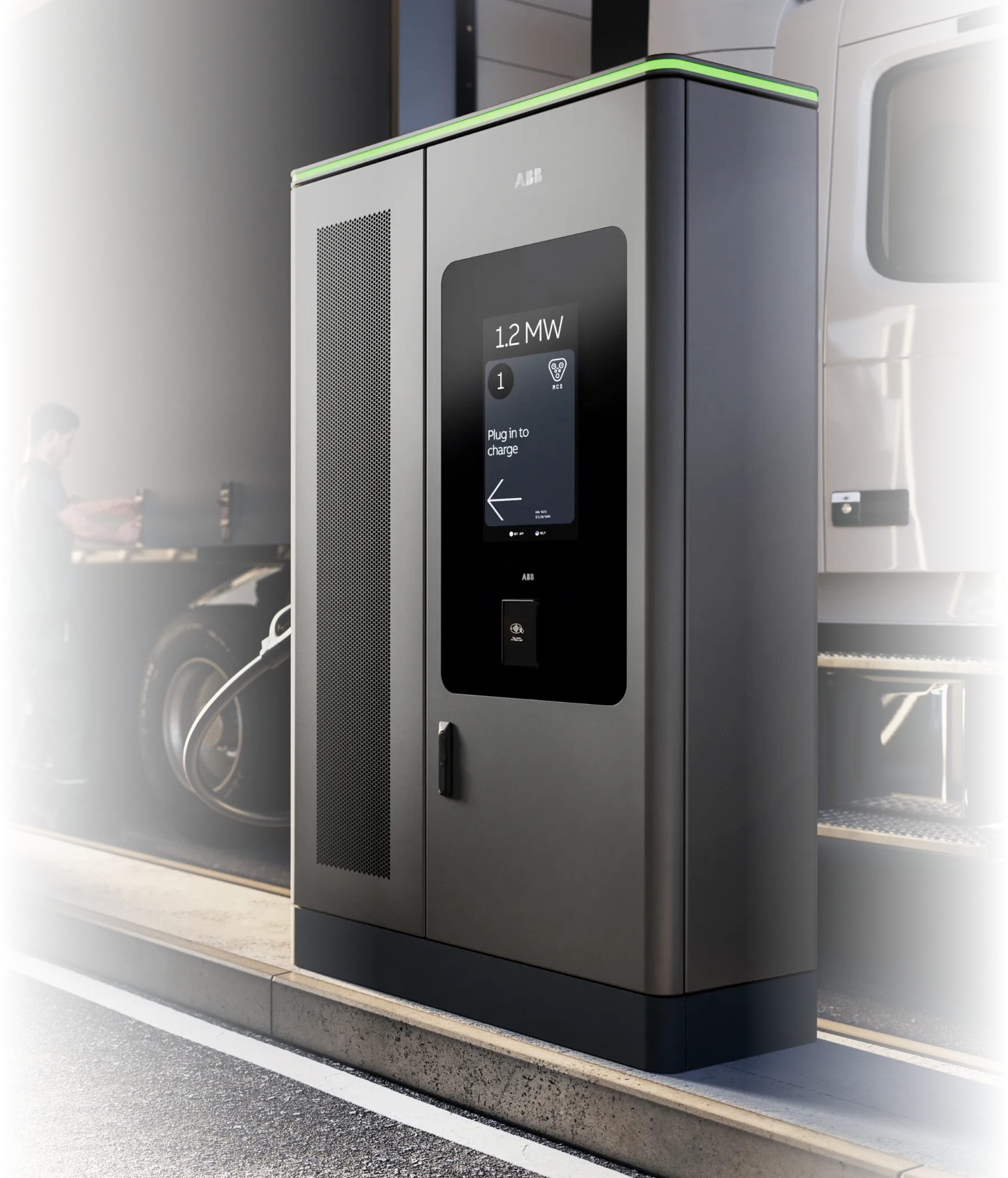 MCS1200 charger ready for use at a truck-charging bay where a driver checks his truck